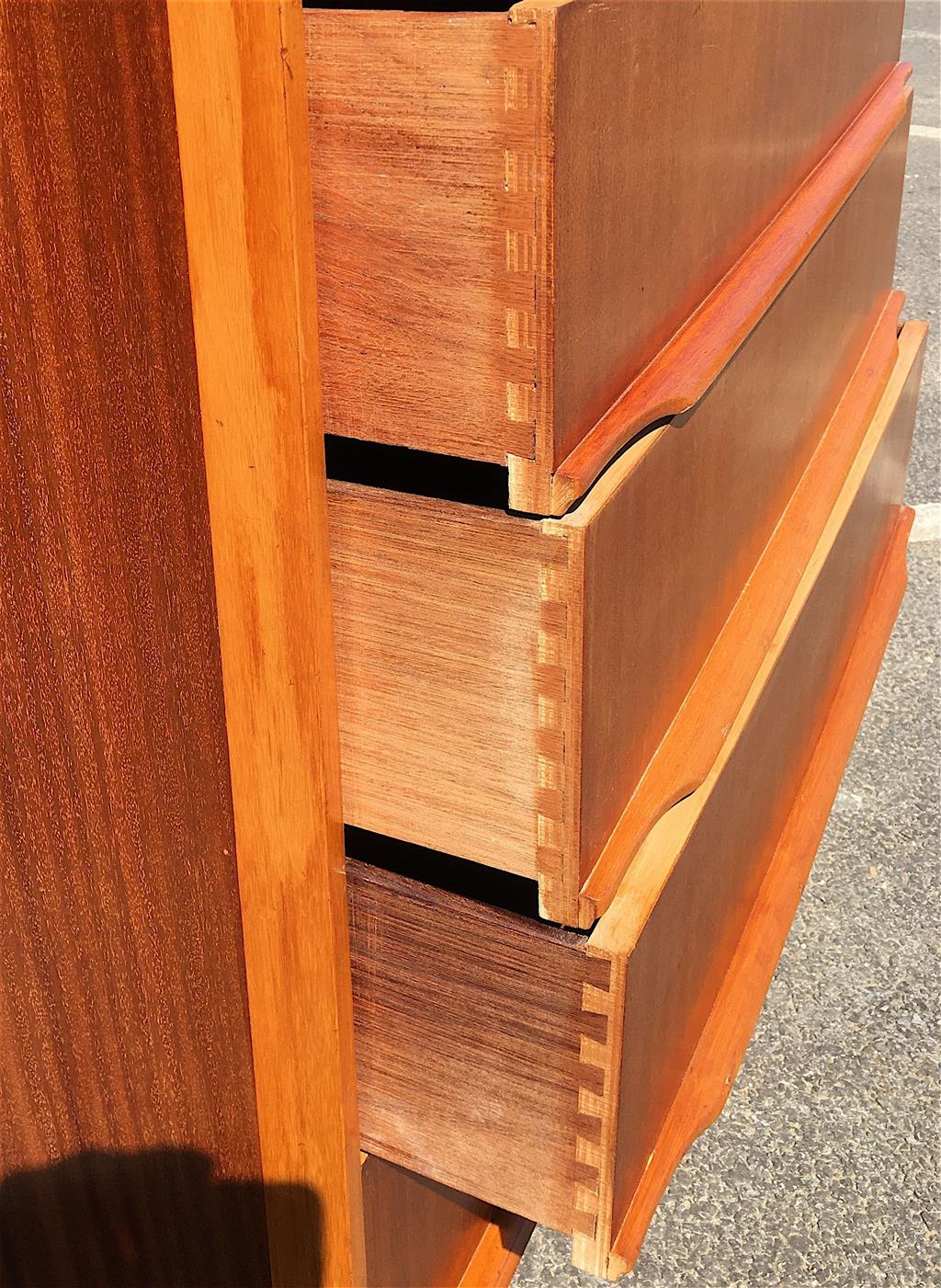 A mid century design mahogany and teak five drawer chest, circa 1960, width 77cm, depth 45cm, height 107cm